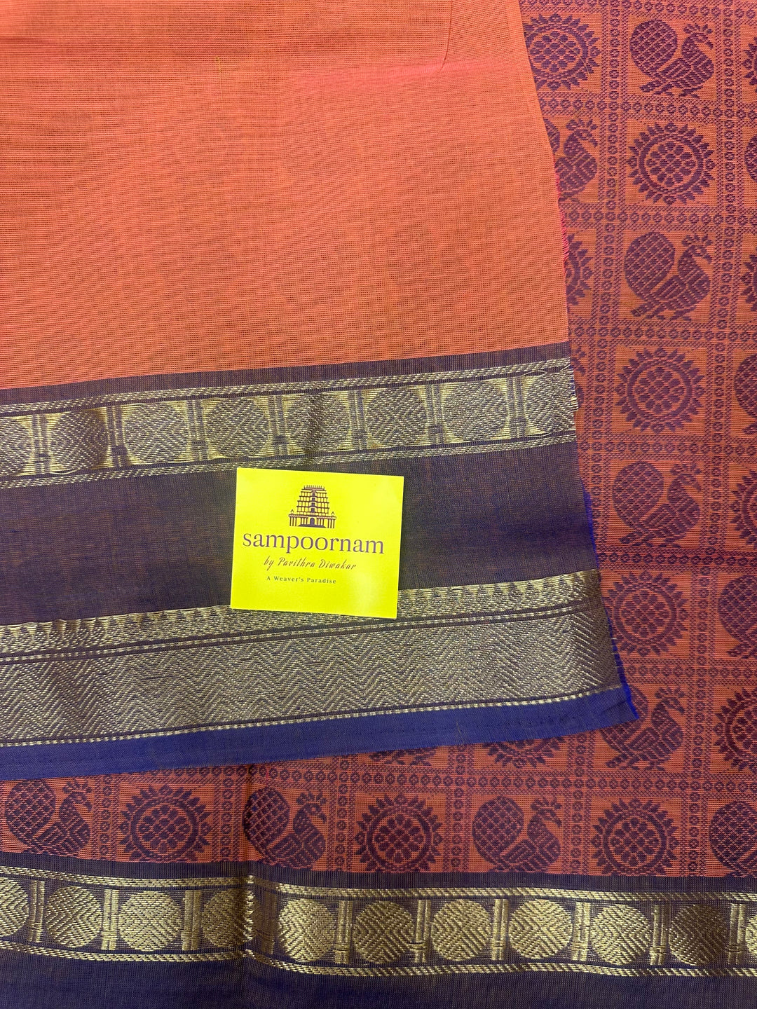 Light Coral with Blue  , Annam and Chakram thread butta in the body  , rettapet border and Plain Pallu Chettinad Cotton Saree