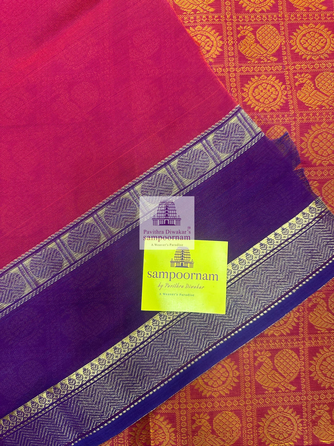 Reddish Orange with Purple  , Annam and Chakram thread butta in the body  , rettapet border and Plain  Pallu Chettinad Cotton Saree