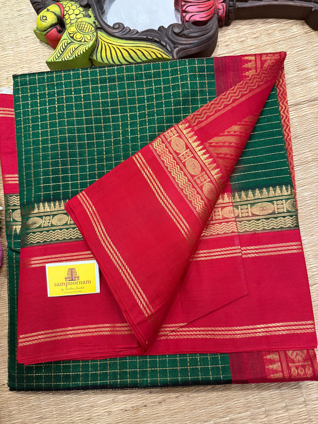 Green with Red , rich zari checks in the body , rettapet border and rich Pallu Korvai Silk Cotton Saree