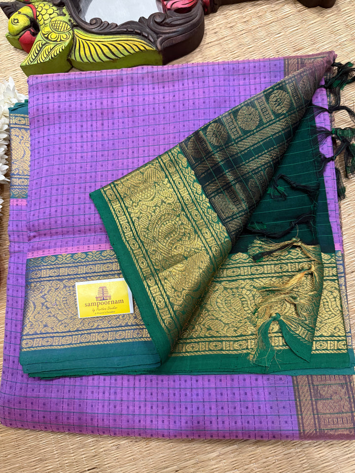 Lavender with Green , Lakshadeepam butta in the body , traditional borders and rich Pallu Lakshadeepam Silk Cotton Saree