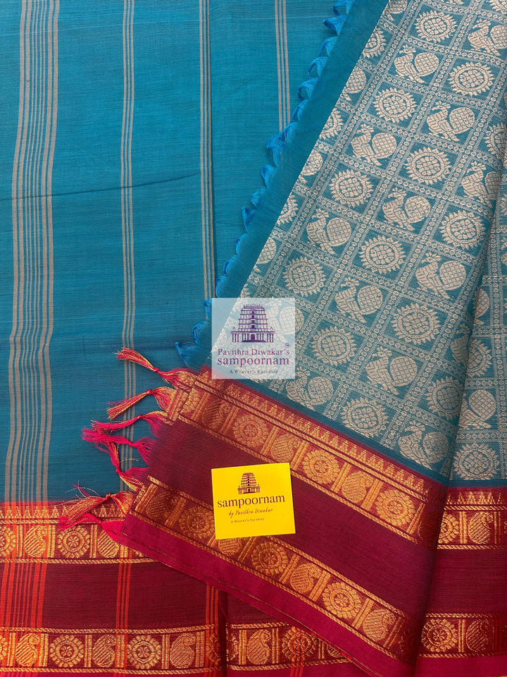 Light Blue with Magenta  , Annam and Chakram thread butta in the body  , rettapet border and Plain  Pallu Chettinad Cotton Saree