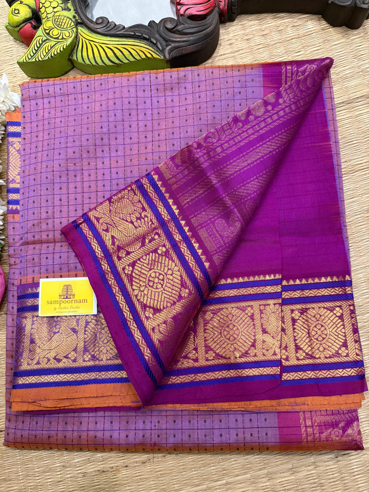 Lavender with Purple , Lakshadeepam butta in the body , traditional borders and rich Pallu Lakshadeepam Silk Cotton Saree