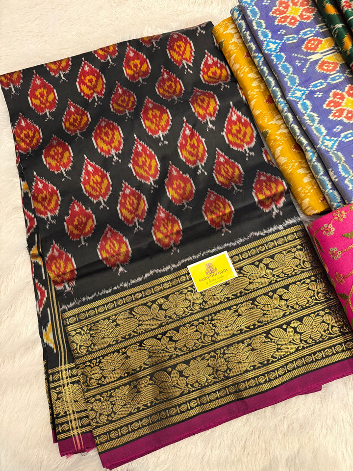 Black with Magenta Selvedge rich Kanchi border , with blouse design and grand Pallu Pochampally Ikkat Silk Saree