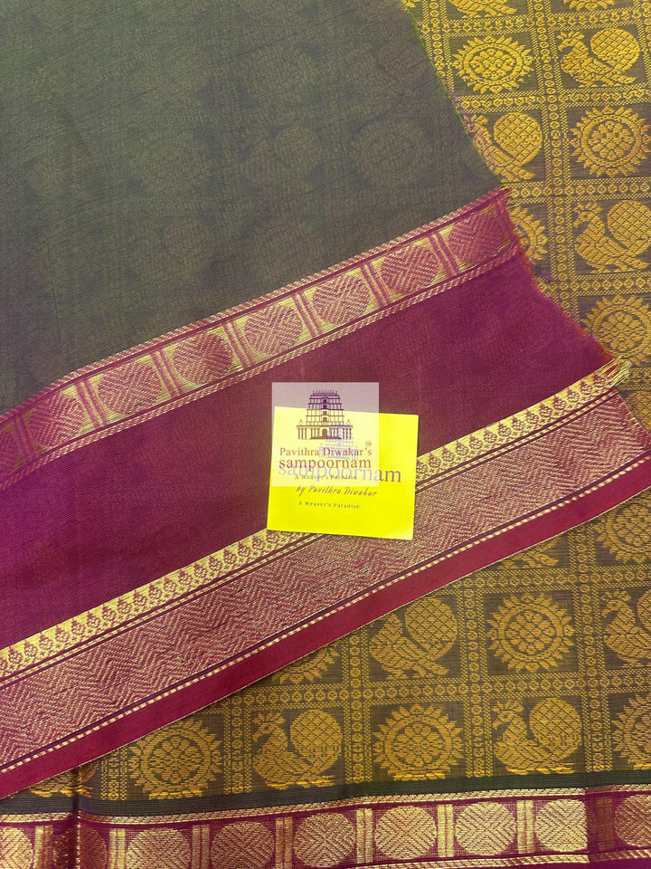 Light Green Ganga Jamuna Border Magenta with Mustard  , Annam and Chakram thread butta in the body  , rettapet border and Plain  Pallu Chettinad Cotton Saree