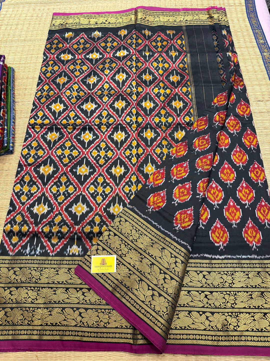 Black with Magenta Selvedge rich Kanchi border , with blouse design and grand Pallu Pochampally Ikkat Silk Saree