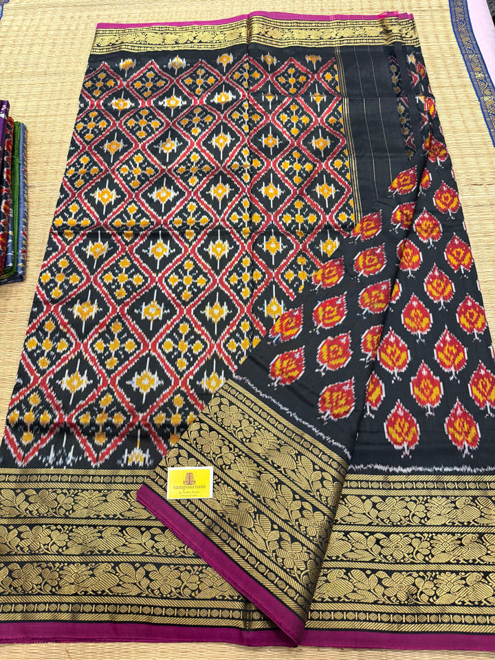 Black with Magenta Selvedge rich Kanchi border , with blouse design and grand Pallu Pochampally Ikkat Silk Saree