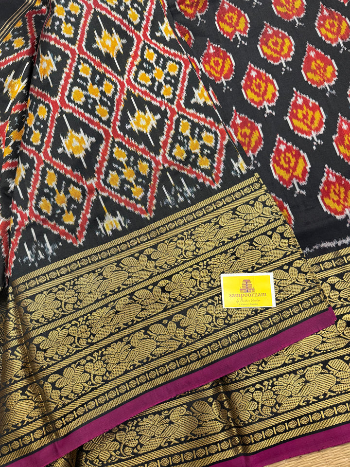 Black with Magenta Selvedge rich Kanchi border , with blouse design and grand Pallu Pochampally Ikkat Silk Saree