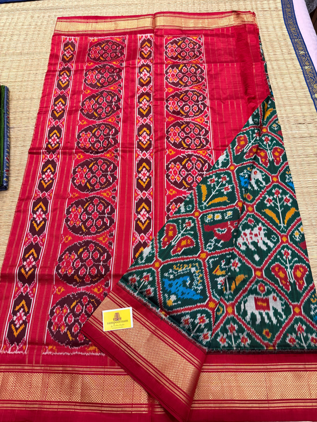 Green with Red , traditional borders and rich Pallu Pochampally Ikkat Silk Saree