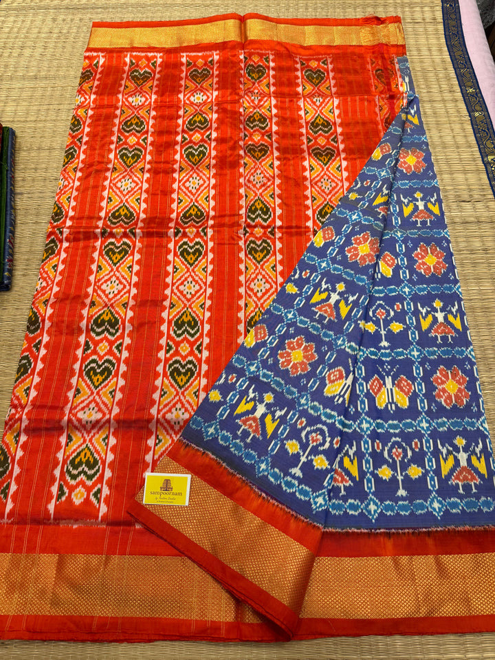 Blue with Orange , traditional borders and rich Pallu Pochampally Ikkat Silk Saree