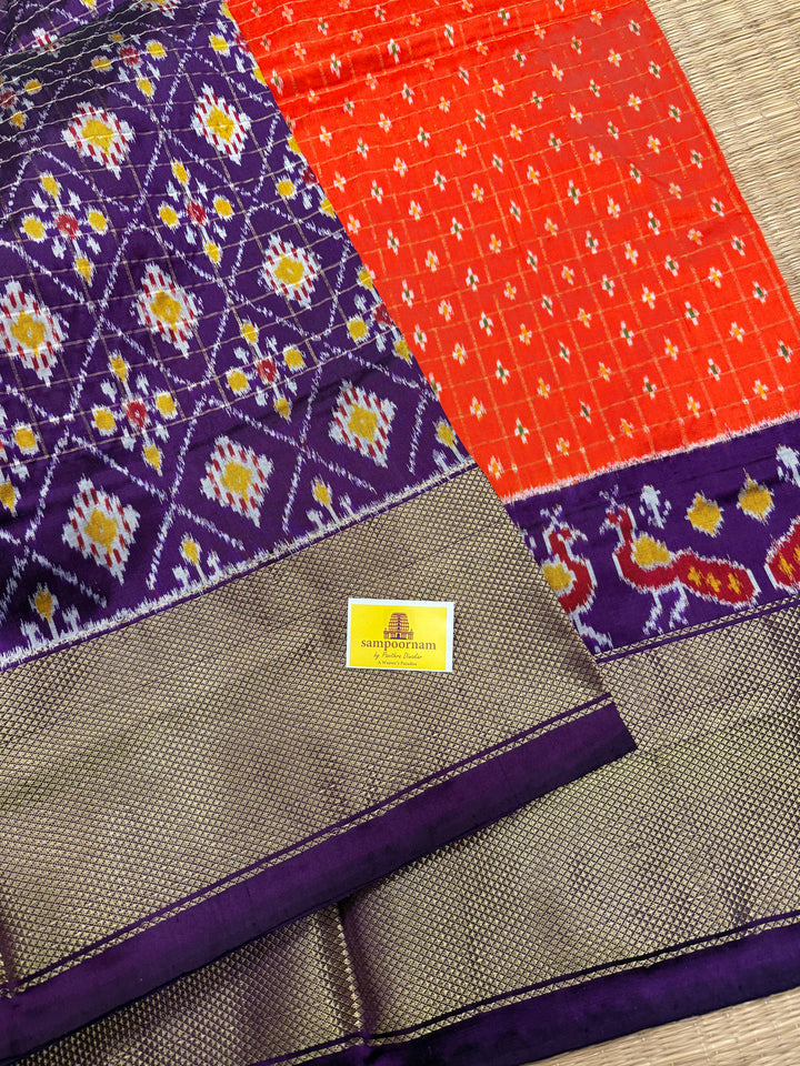 Orange with Purple ,checks in the body , traditional borders , work in blouse and rich Pallu Pochampally Ikkat Silk Saree