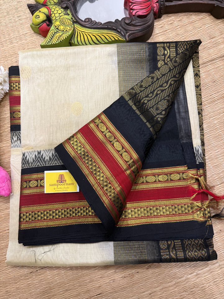OffWhite with Black ,Rich Zari Butta in the body,traditional rettapet temple Thread Border and rich  Pallu Korvai Silk Cotton Saree