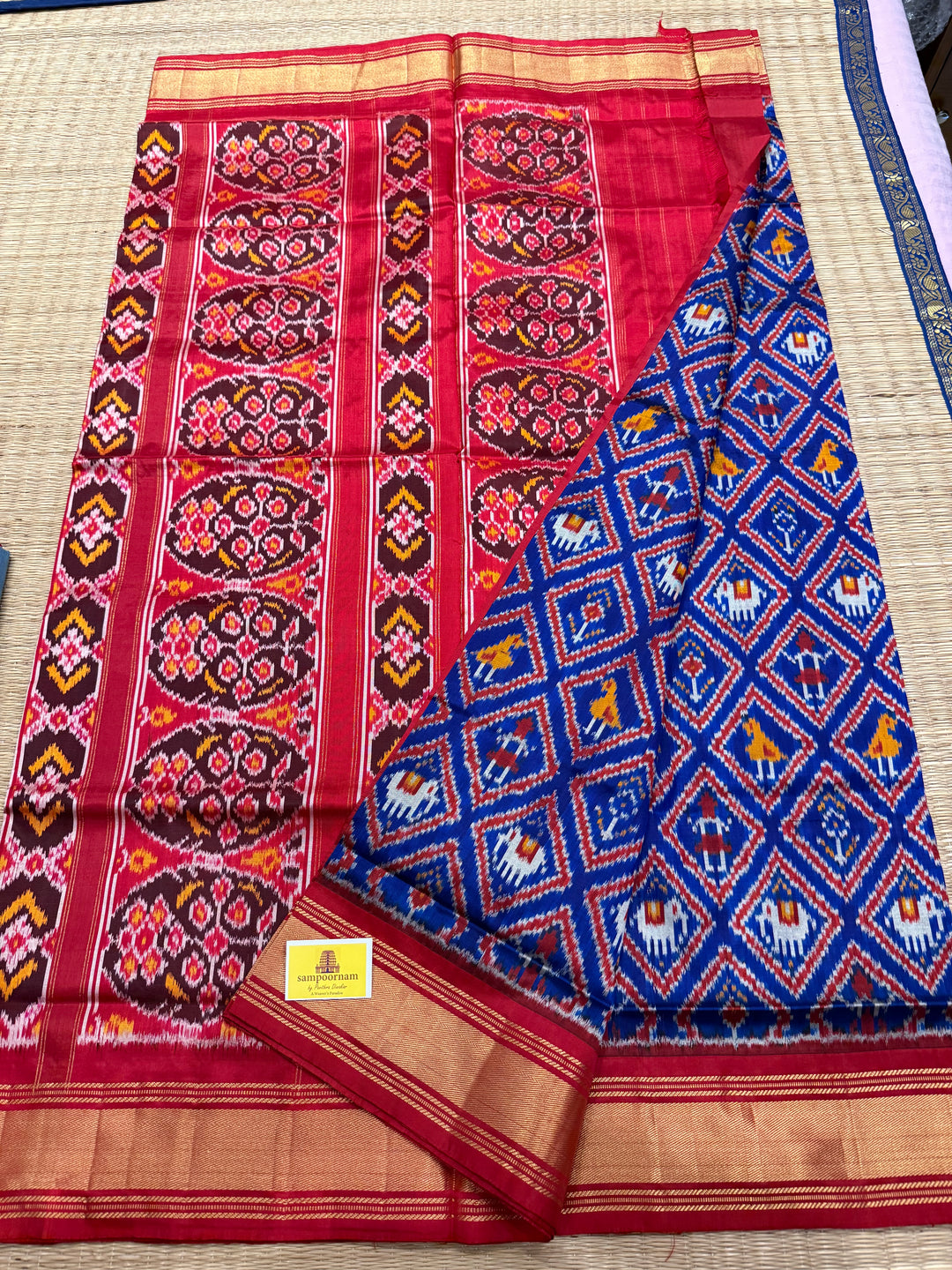 Blue with Red , traditional borders and rich Pallu Pochampally Ikkat Silk Saree