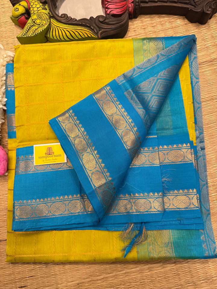 Lemon Yellow with Turquoise Blue Rich Zari Checks in the body Rettapet Borders and traditional Pallu Korvai Silk Cotton Saree