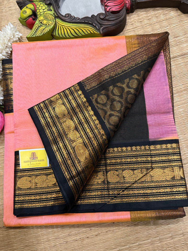 Peachish Pink with Black Vairaoosi Zari Lines in the body traditional borders and rich Pallu Korvai Silk Cotton Saree