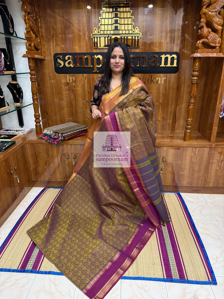 Light Green Ganga Jamuna Border Magenta with Mustard  , Annam and Chakram thread butta in the body  , rettapet border and Plain  Pallu Chettinad Cotton Saree