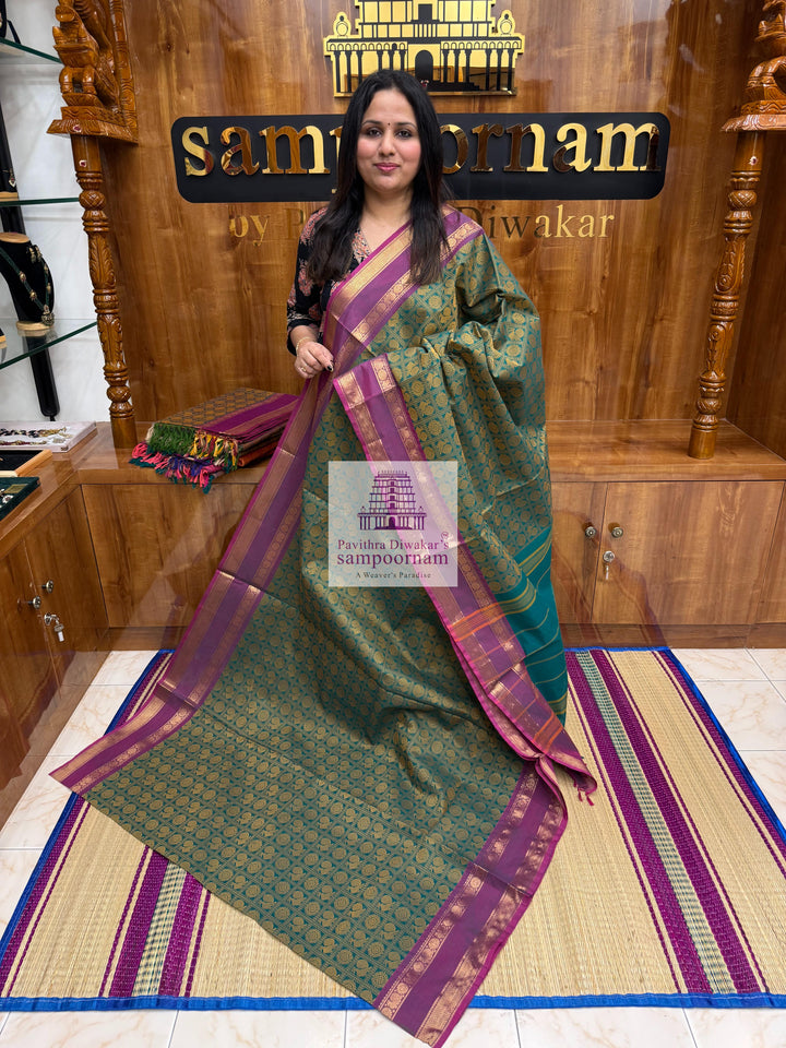 Green with Light Magenta  , Annam and Chakram thread butta in the body  , rettapet border and Plain  Pallu Chettinad Cotton Saree