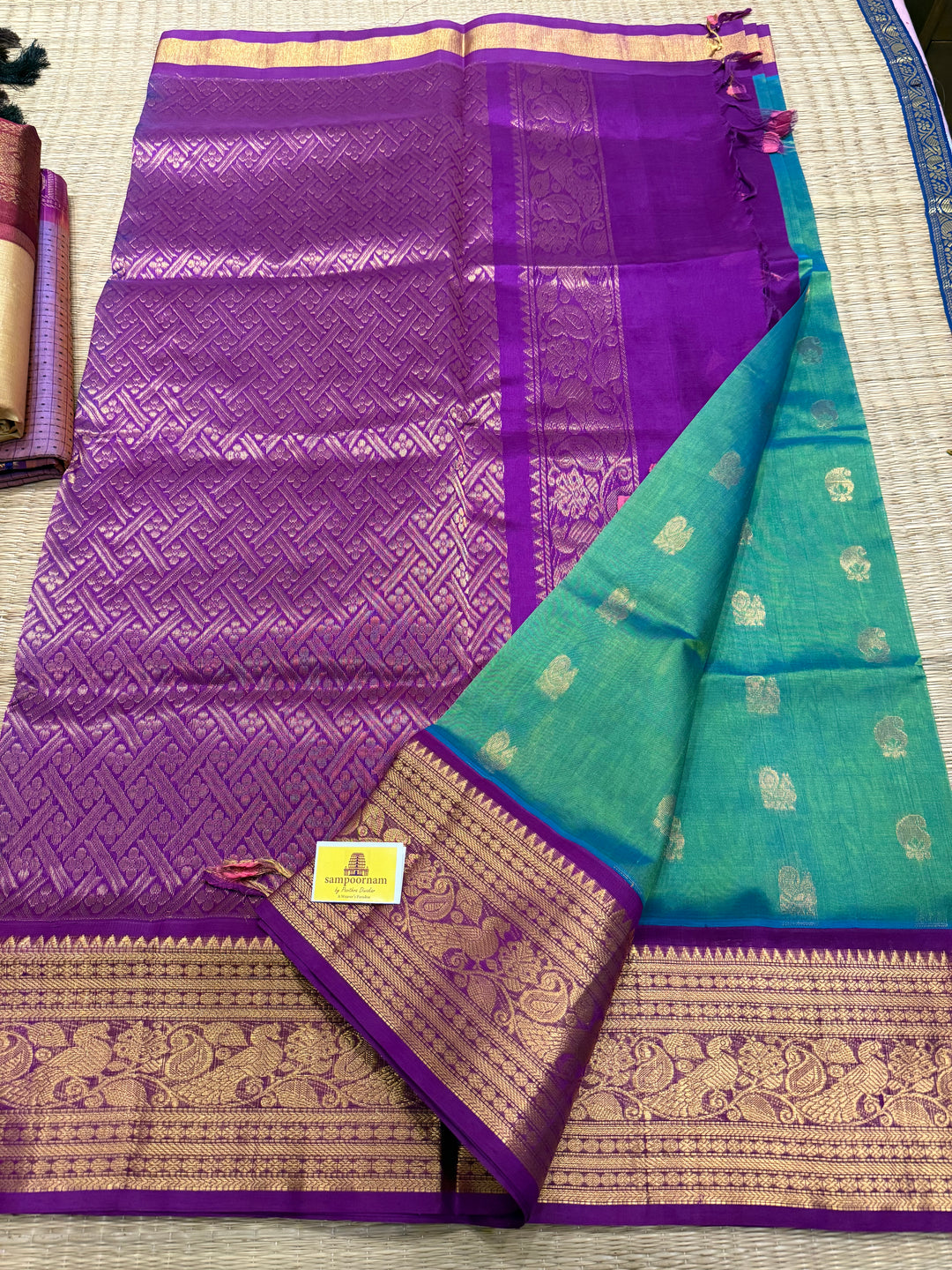 Bluish Green with Purple ,one Side Big Kanchi Border with Rich Zari Butta in the Body and Grand Pallu Korvai Silk Cotton Saree
