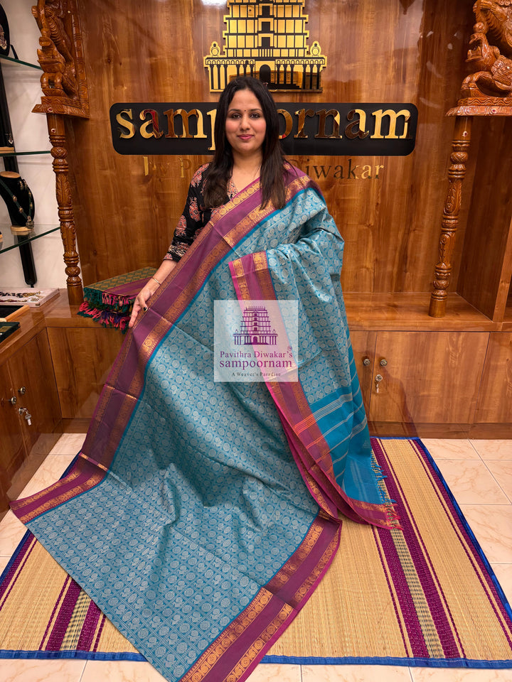 Light Blue with Magenta  , Annam and Chakram thread butta in the body  , rettapet border and Plain  Pallu Chettinad Cotton Saree