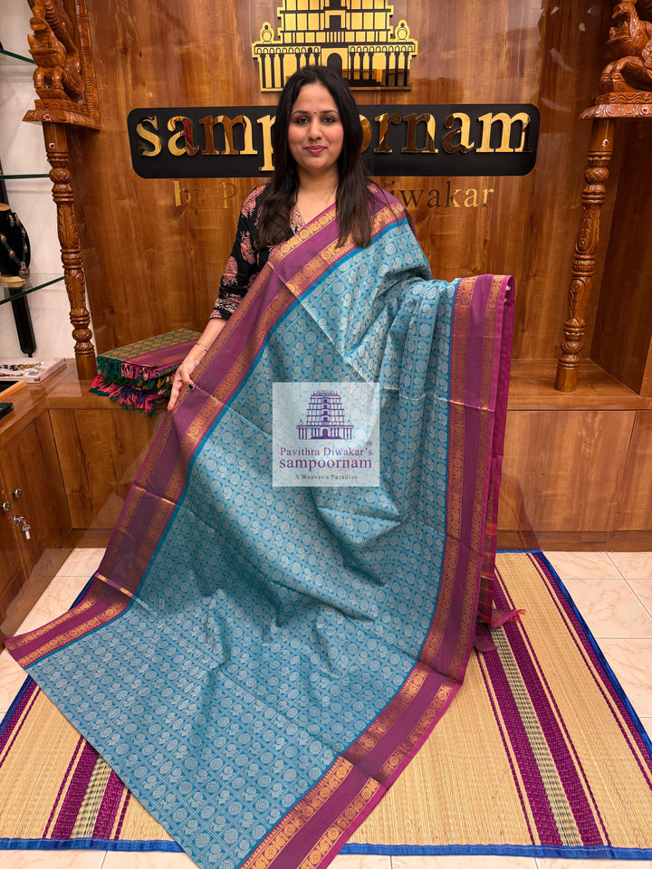 Light Blue with Light Magenta  , Annam and Chakram thread butta in the body  , rettapet border and Plain  Pallu Chettinad Cotton Saree