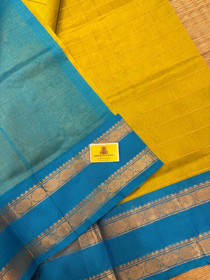 Lemon Yellow with Turquoise Blue Rich Zari Checks in the body Rettapet Borders and traditional Pallu Korvai Silk Cotton Saree
