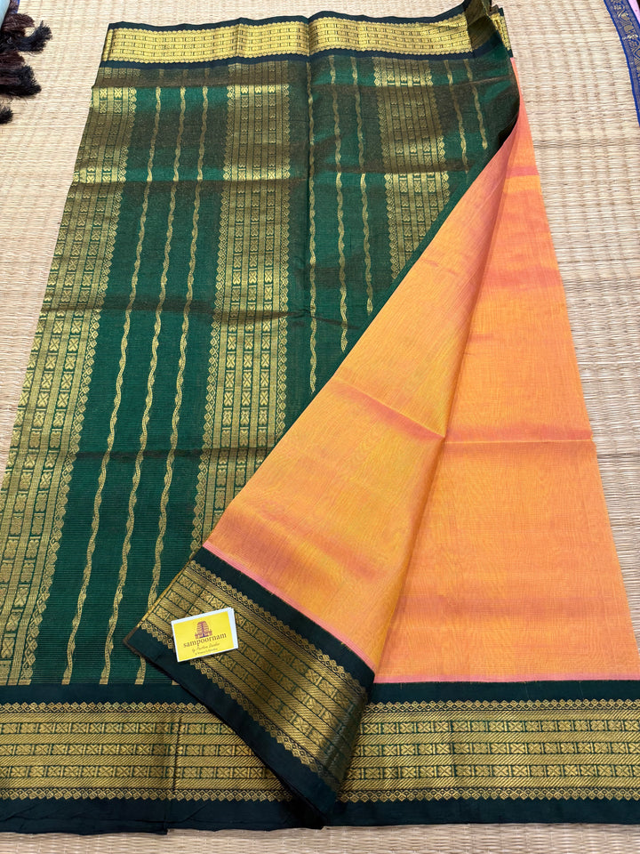 Peachish Orange with Green Vairaoosi Zari Lines in the Body traditional Borders and Rich Pallu Korvai Silk Cottton Saree