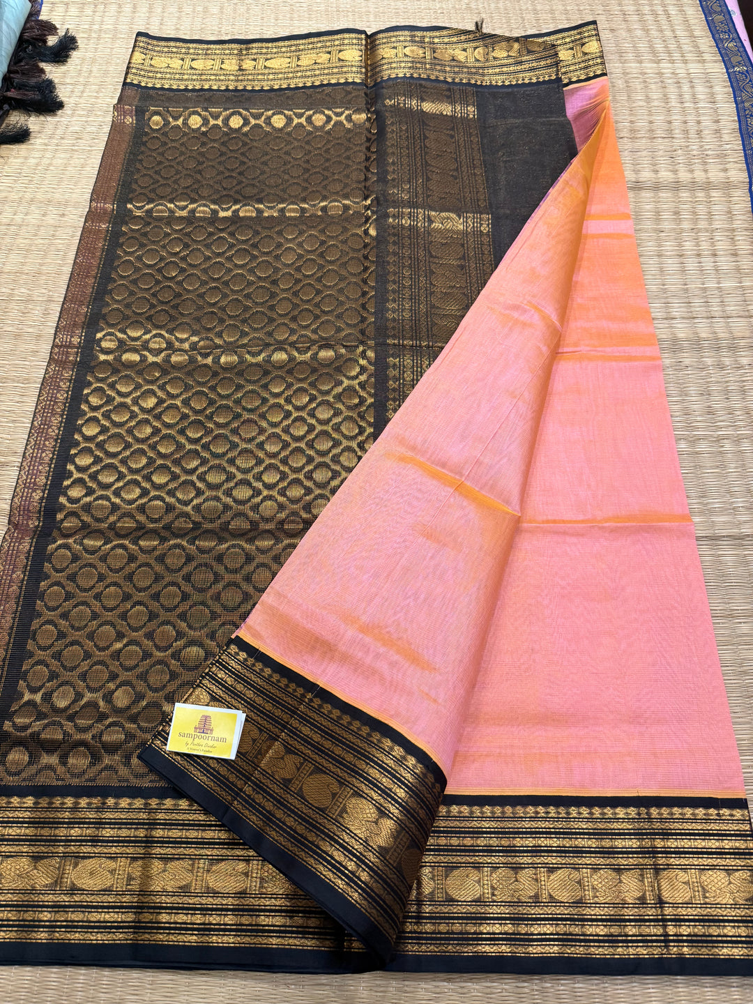 Peachish Pink with Black Vairaoosi Zari Lines in the body traditional borders and rich Pallu Korvai Silk Cotton Saree