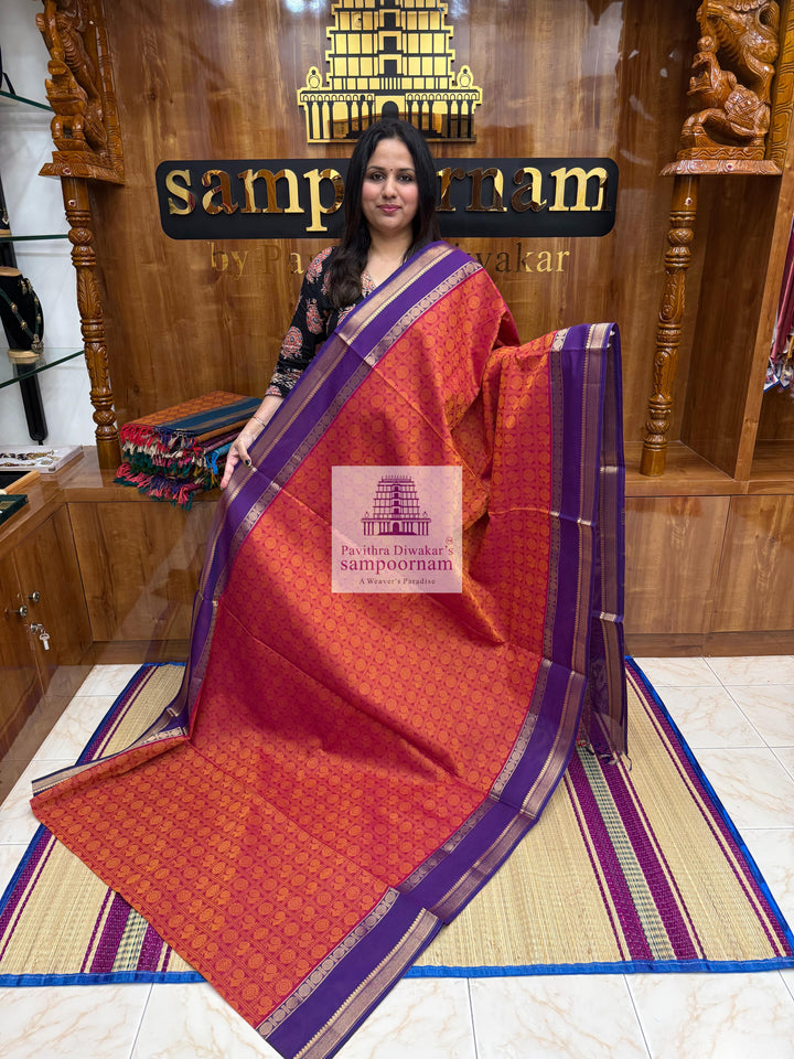 Reddish Orange with Purple  , Annam and Chakram thread butta in the body  , rettapet border and Plain  Pallu Chettinad Cotton Saree
