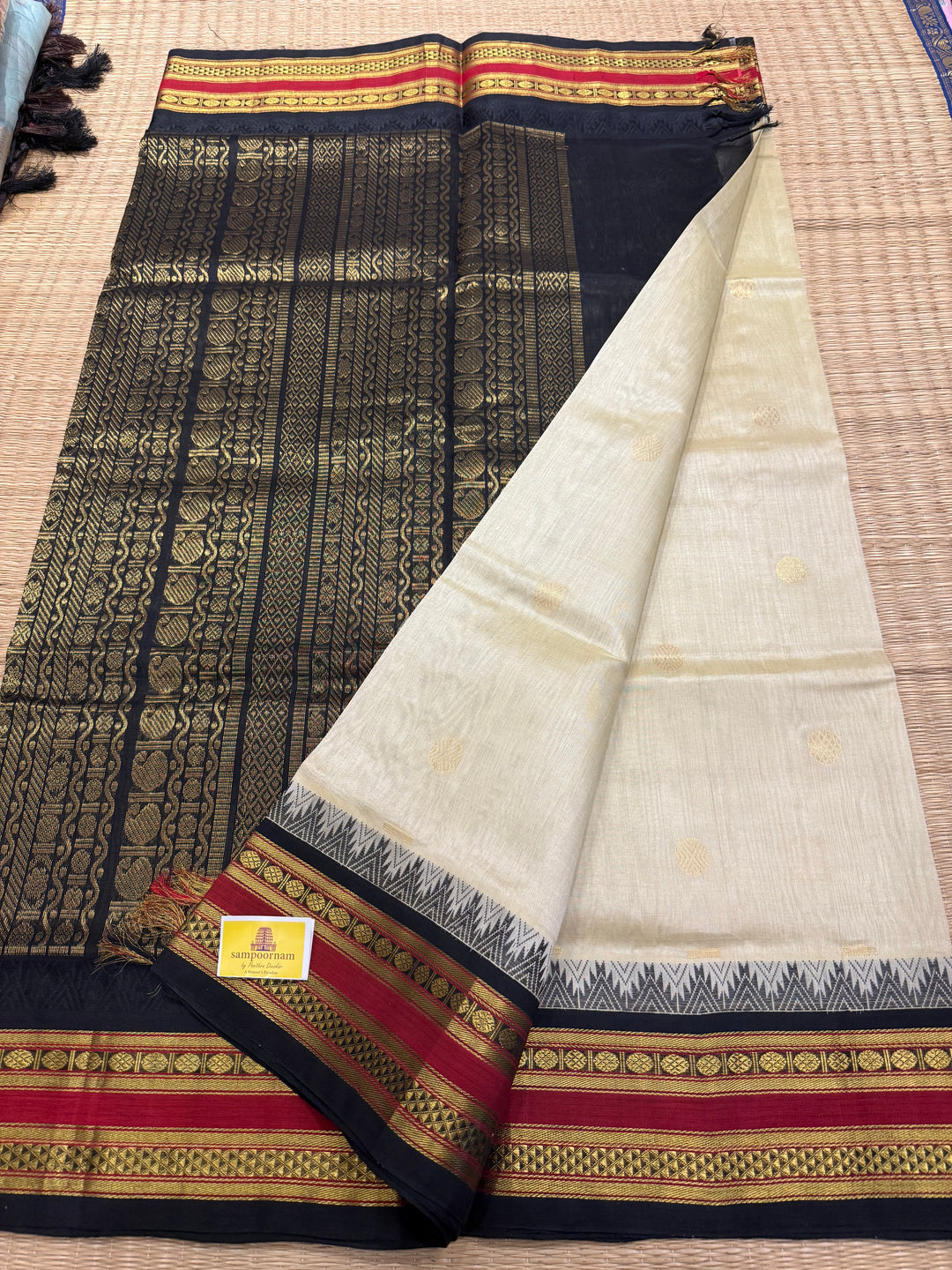 OffWhite with Black ,Rich Zari Butta in the body,traditional rettapet temple Thread Border and rich  Pallu Korvai Silk Cotton Saree