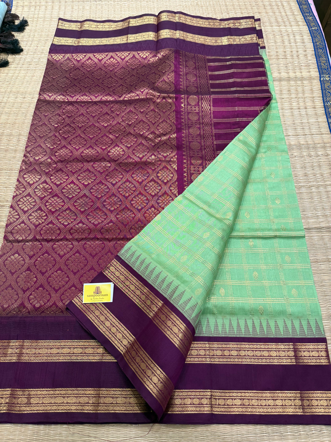 Mint Green with Dark Maroon , rich zari butta in the body , traditional rettapet border and rich Pallu Korvai Silk Cotton Saree