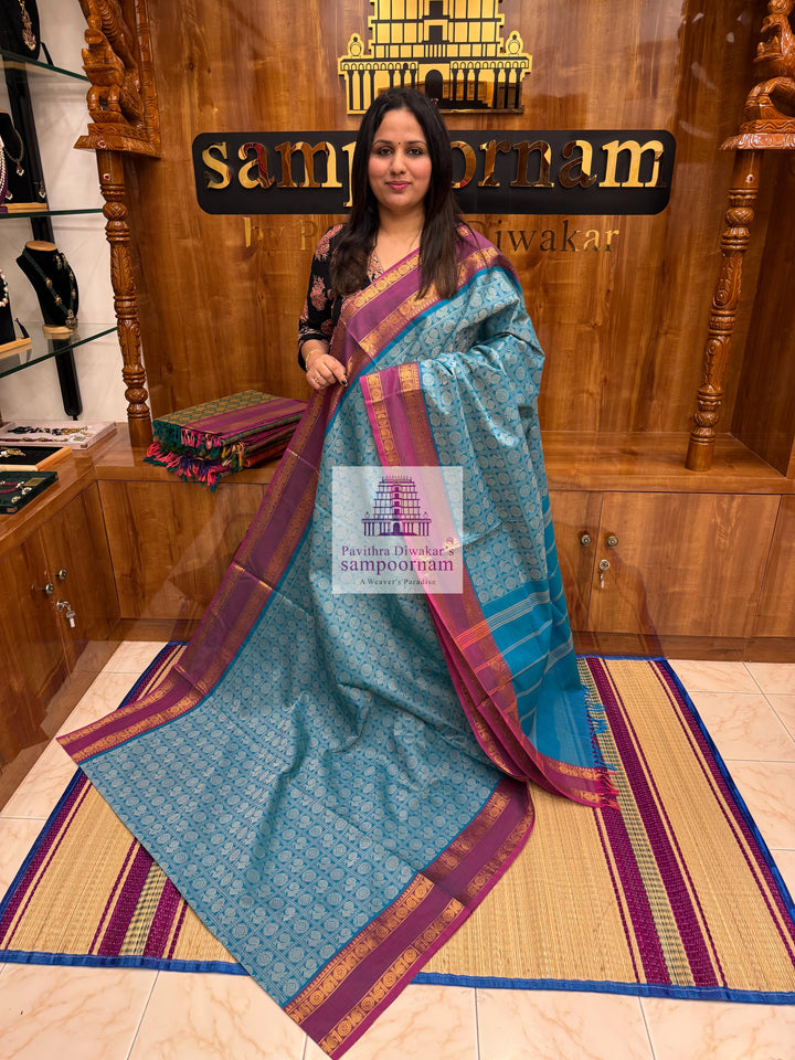 Light Blue with Light Magenta  , Annam and Chakram thread butta in the body  , rettapet border and Plain  Pallu Chettinad Cotton Saree