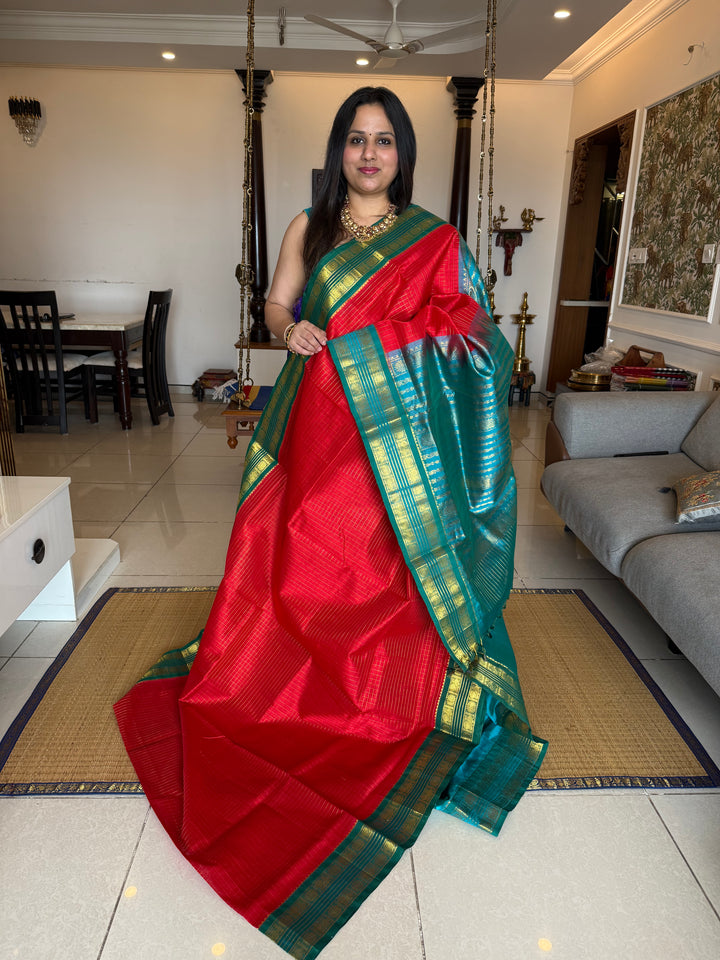 Chilli Red with Turquise Blue Rich Zari Checks in the Body and Traditional Rettapet Border and Grand Pallu orvai Silk Cotton saree