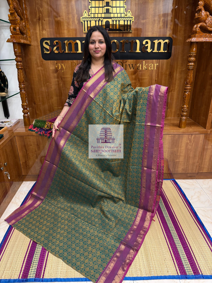 Green with Light Magenta  , Annam and Chakram thread butta in the body  , rettapet border and Plain  Pallu Chettinad Cotton Saree