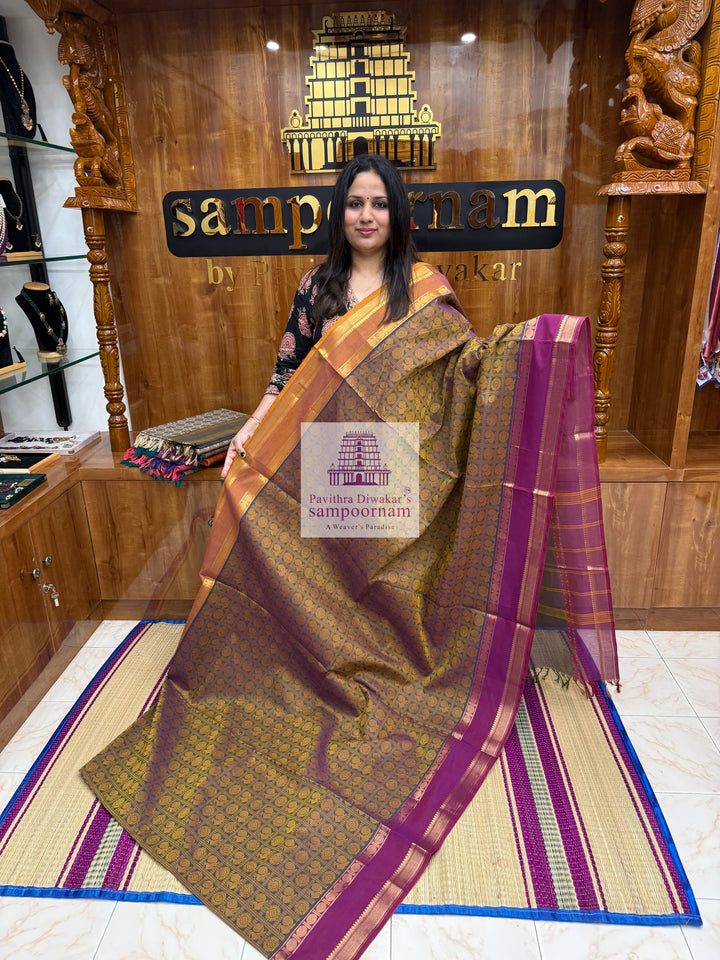 Light Green Ganga Jamuna Border Magenta with Mustard  , Annam and Chakram thread butta in the body  , rettapet border and Plain  Pallu Chettinad Cotton Saree