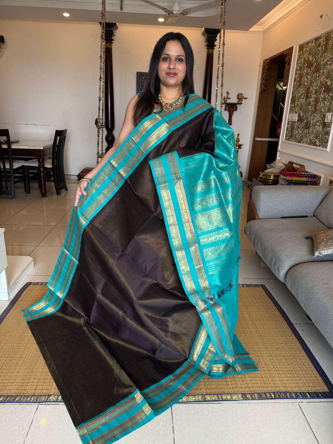 Black with Turquoise Blue ,Zari Podi Kattam in the body ,rettapet border and rich Pallu Korvai Silk Cotton Saree