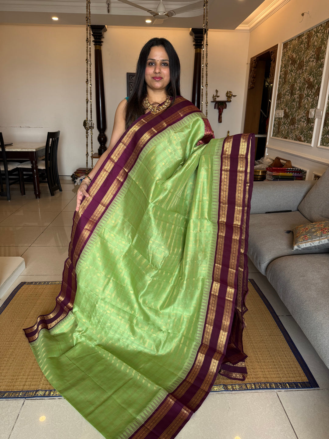 Mint Green with Dark Maroon , rich zari butta in the body , traditional rettapet border and rich Pallu Korvai Silk Cotton Saree