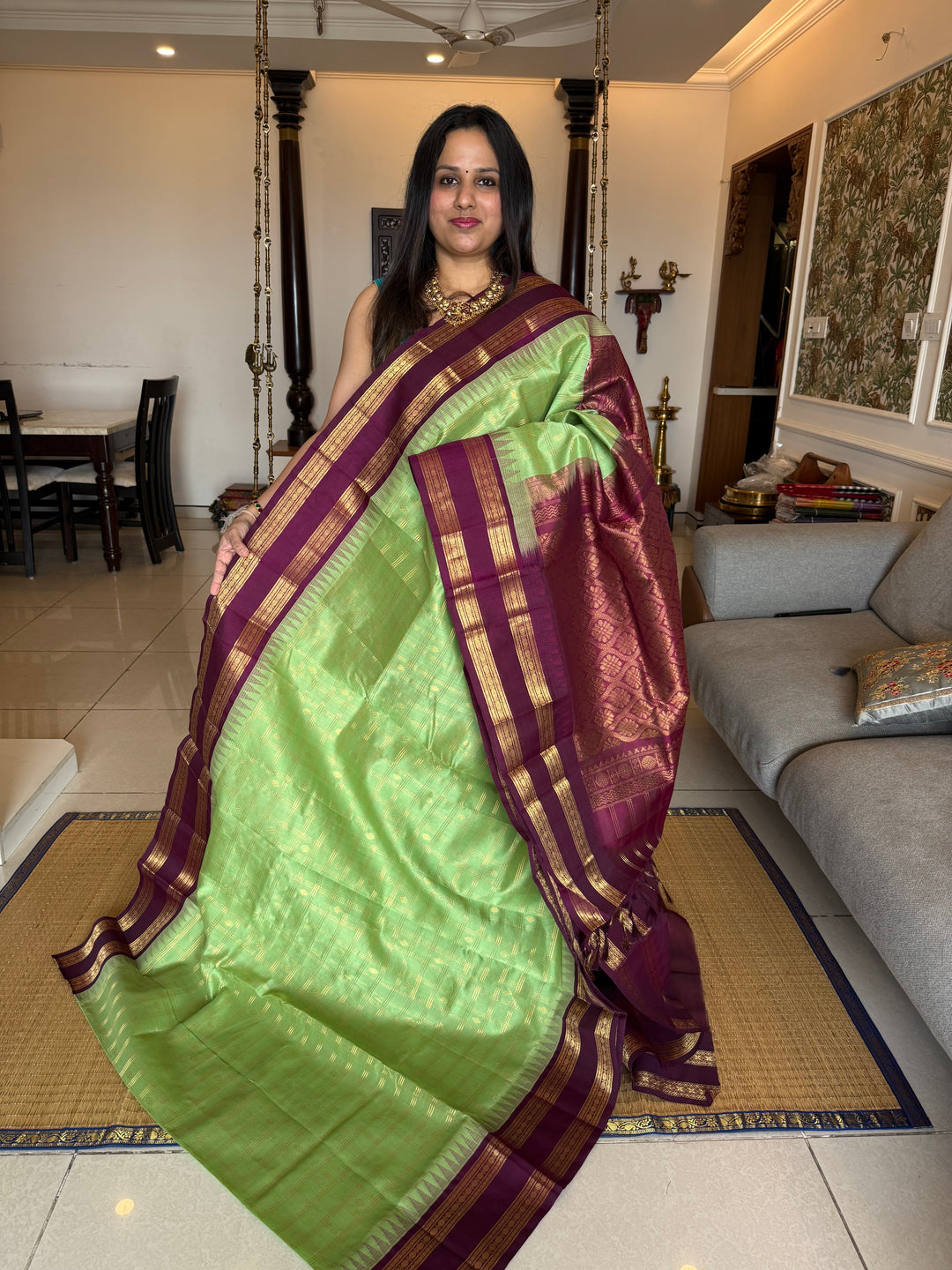 Mint Green with Dark Maroon , rich zari butta in the body , traditional rettapet border and rich Pallu Korvai Silk Cotton Saree
