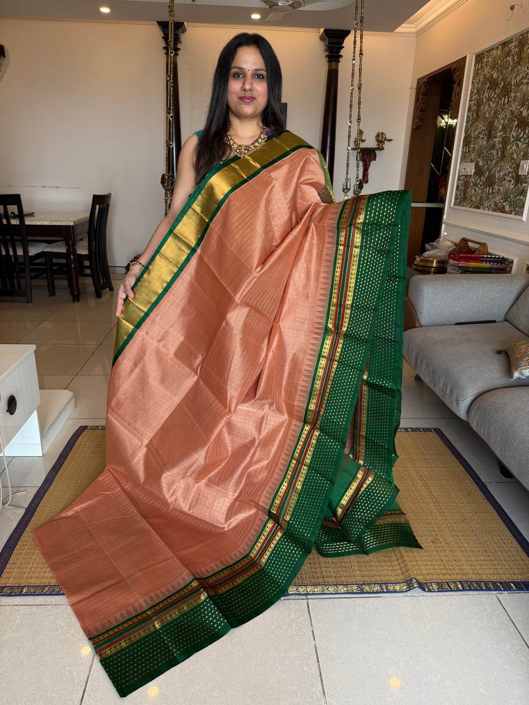 Biscuit Green ,One Side Big Border with Lakshadeepam Butta , Zari Checks in the  body and Rich Pallu Korvai Silk Cotton saree