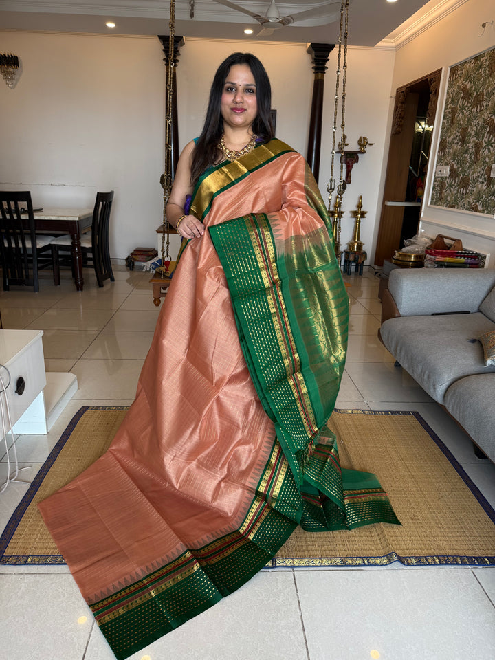Biscuit Green ,One Side Big Border with Lakshadeepam Butta , Zari Checks in the  body and Rich Pallu Korvai Silk Cotton saree