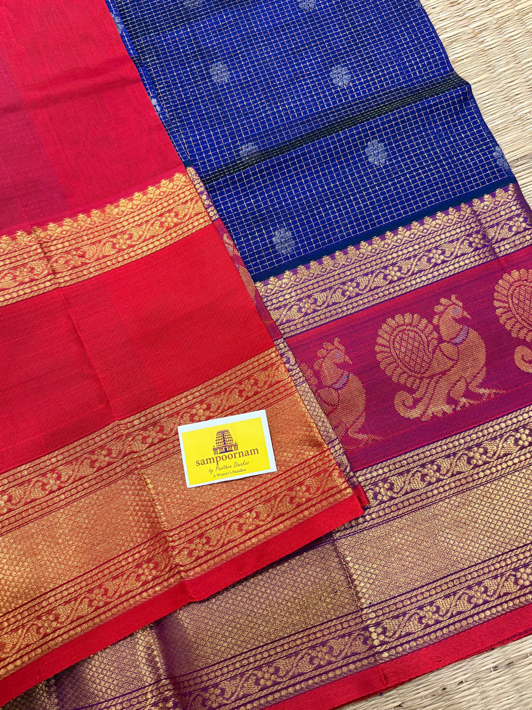 Dark Blue with Red, One Side Big Satin Border with Peacock Motifs, Body Zari Podi Kattam and Silver Floral Zari Butta in the Body and Rich Pallu Korvai Silk Cotton Saree