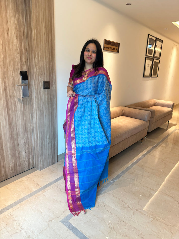 Light Blue with Dark Magenta , Annam and Chakram Butta in the body and plain Pallu Chettinad Cotton Saree