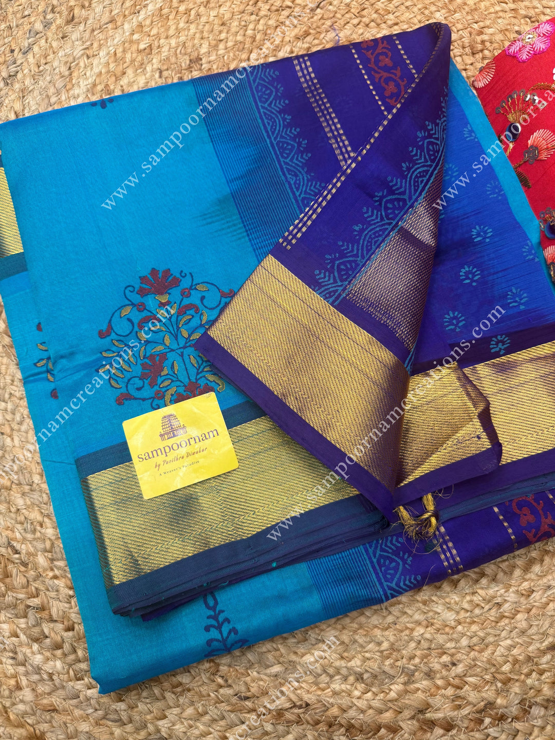 Blueish Green with Dark Blue  , Floral Print in the body  and Rich Pallu Handblock Printed Silk Cotton Saree