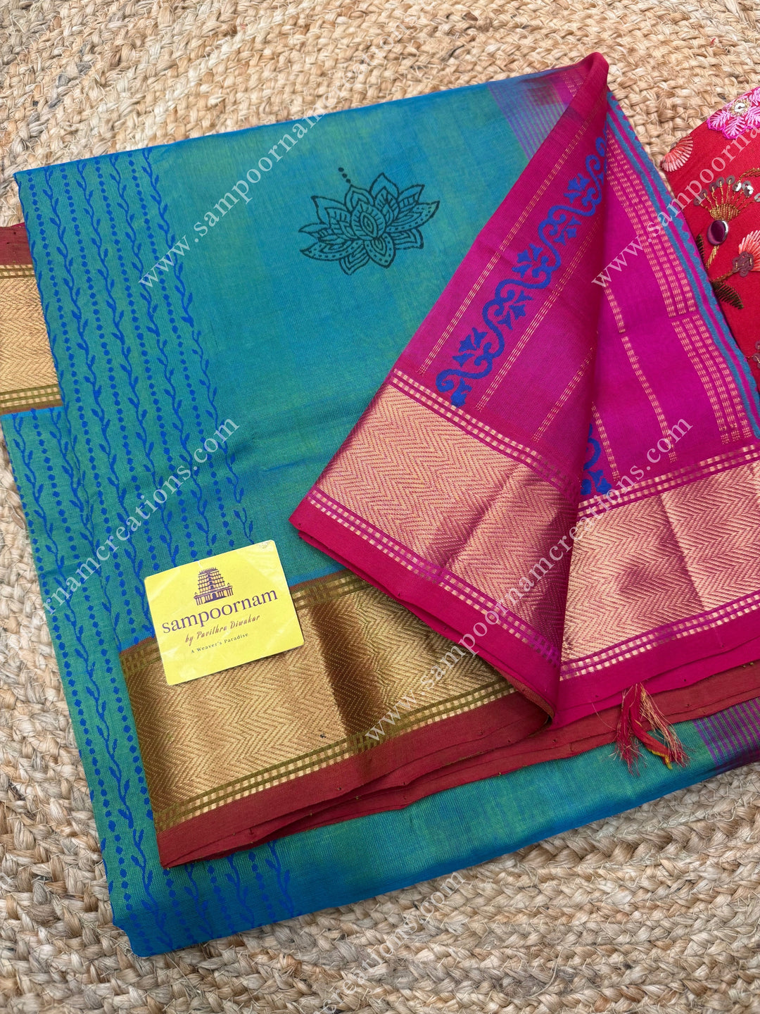 Blueish Green with Rani pink , Lotus motif in the body and  Rich Pallu Handblock Printed Silk Cotton Saree