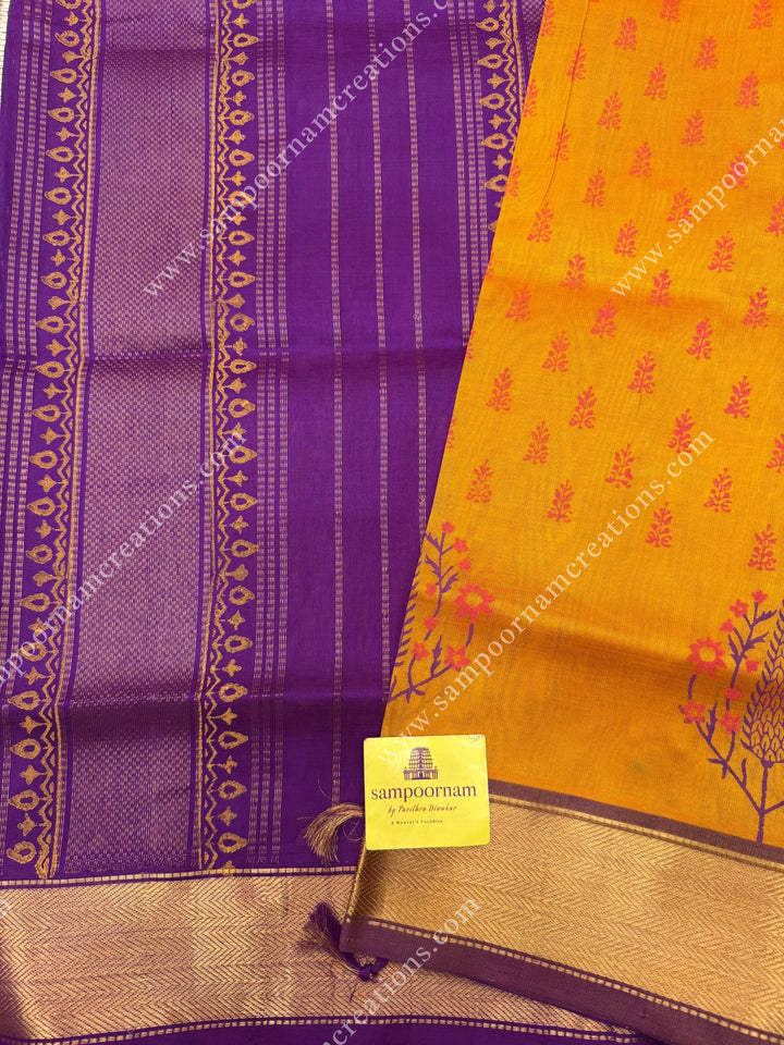 Manjal with Magenta  , Floral Print in the body  and Rich Pallu Handblock Printed Silk Cotton Saree