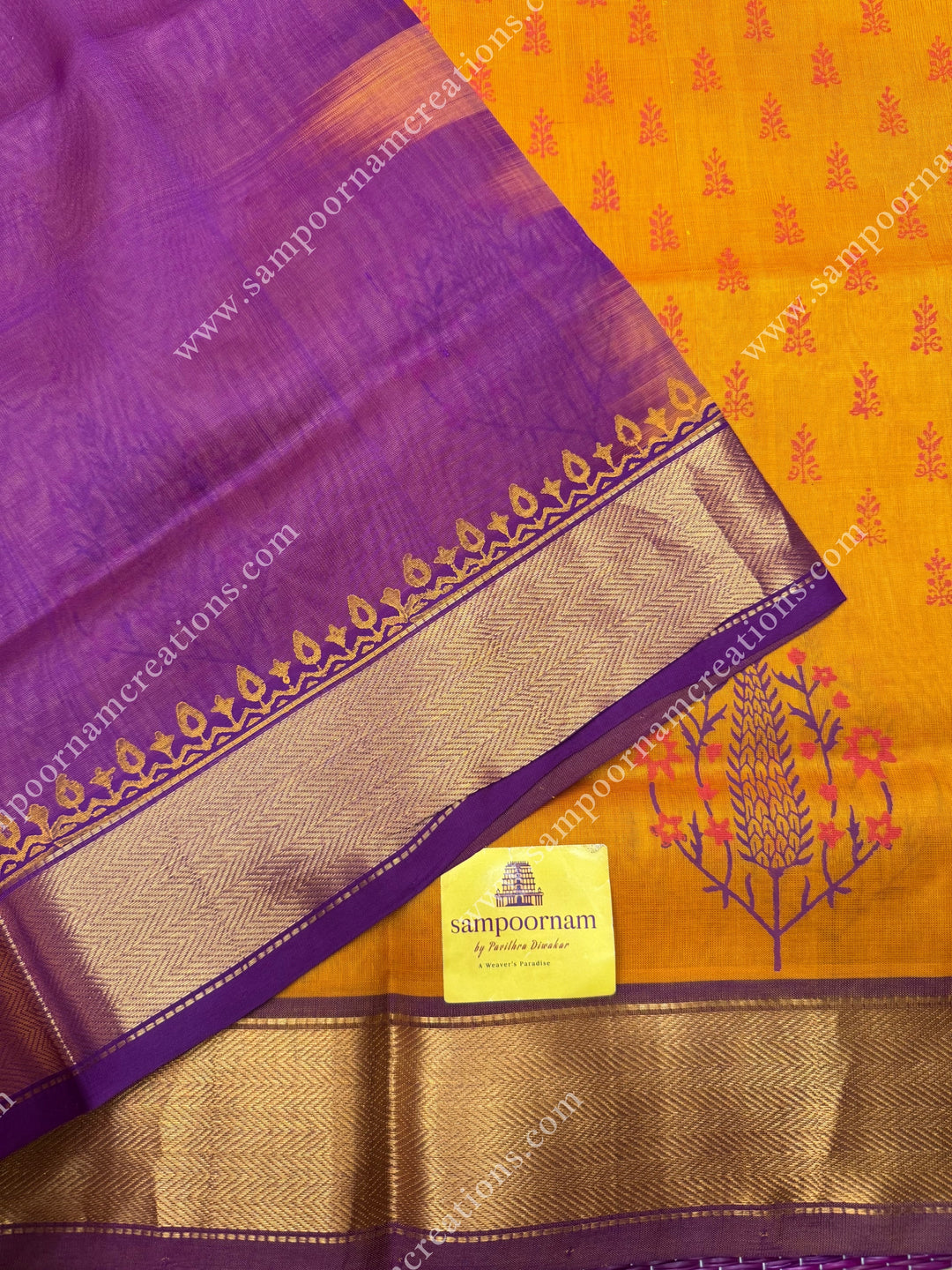 Manjal with Magenta  , Floral Print in the body  and Rich Pallu Handblock Printed Silk Cotton Saree