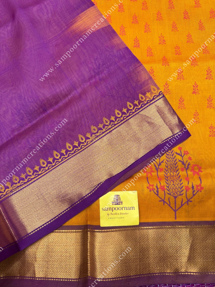 Manjal with Magenta  , Floral Print in the body  and Rich Pallu Handblock Printed Silk Cotton Saree