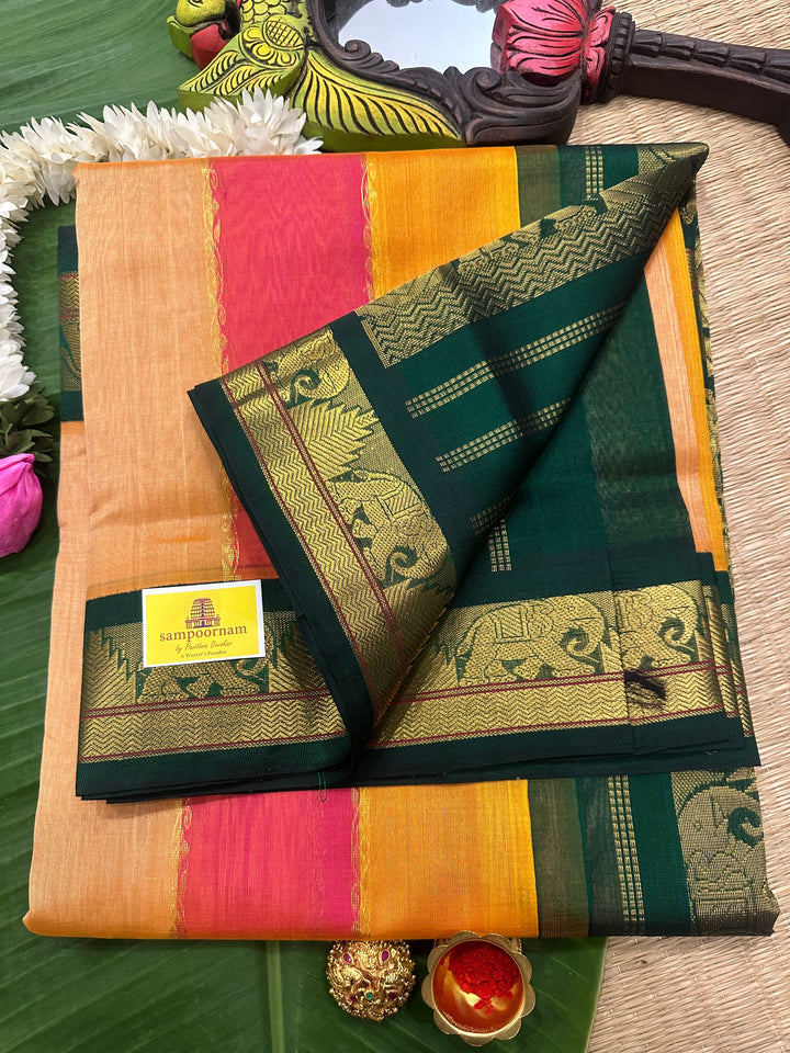 A fusion of Colours Pink , Biscuit and Orange with Green Border and Pallu Korvai Silk Cotton Saree