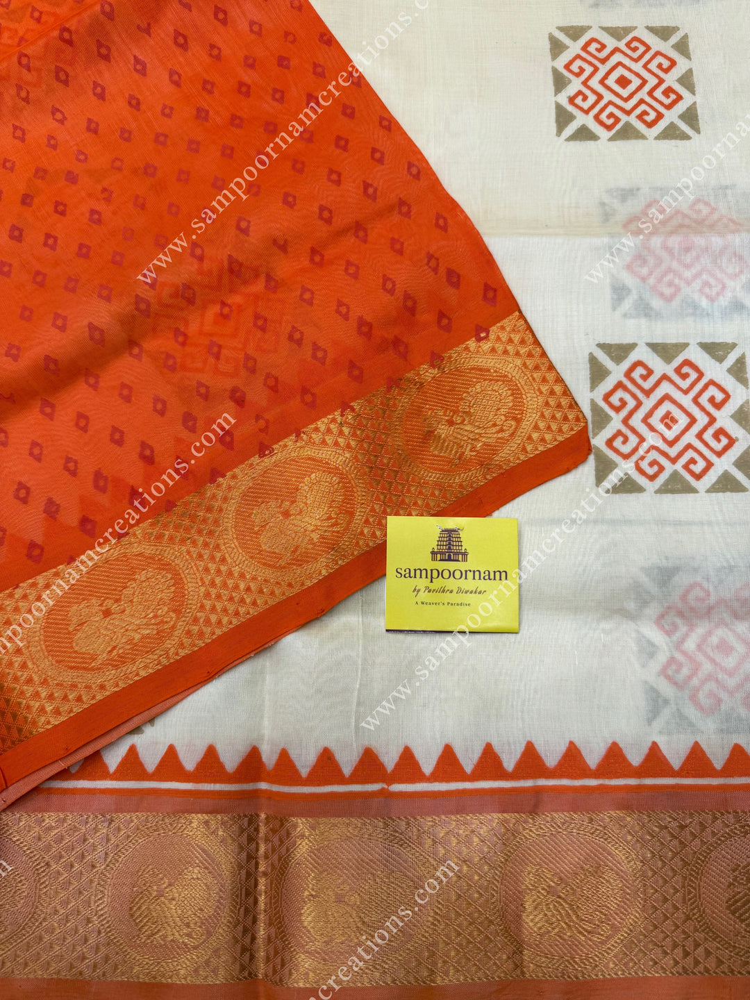 Offwhite with Orange , Geometric Block Print in the body  and Rich Pallu Handblock Printed Silk Cotton Saree