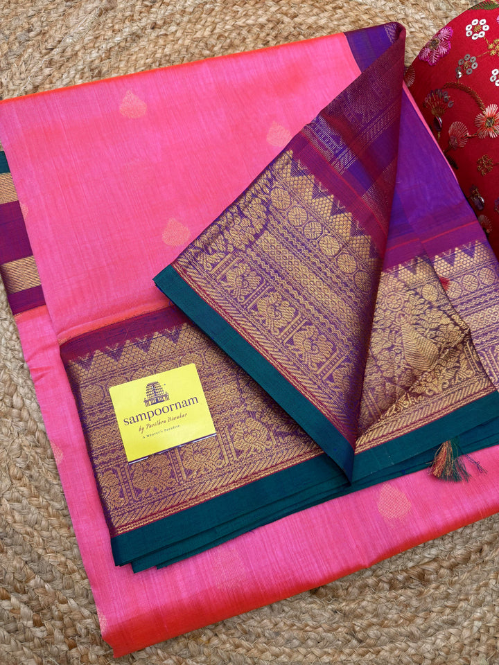 Pink with Magenta , Rich Thilagam Zari butta in the body , One side big borders and rich Pallu Korvai Silk Cotton Saree