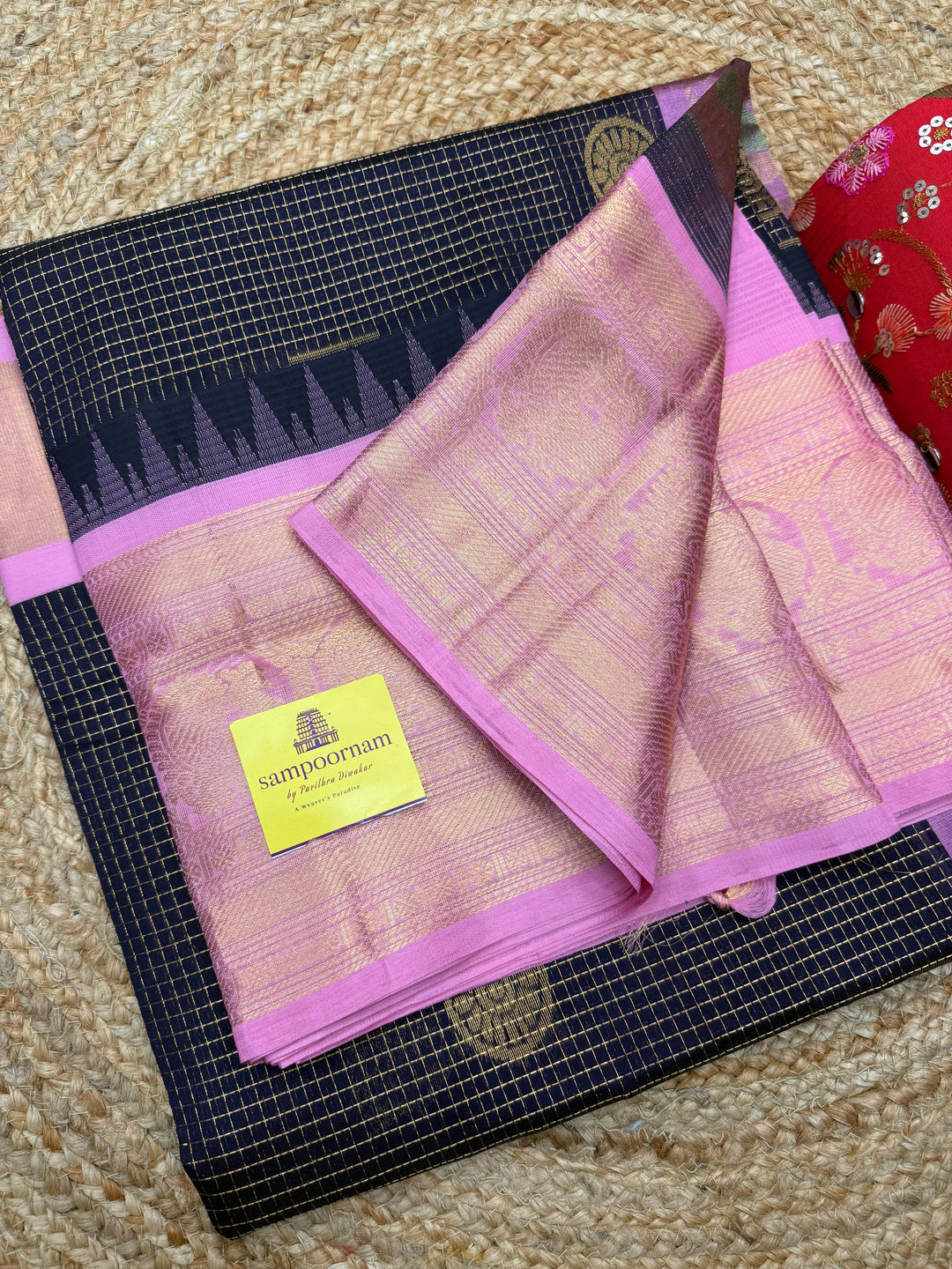 Dark Blue with Baby Pink , Rich Zari checks with Chakkram butta in the body , Traditional One side big border and rich Pallu Korvai Silk Cotton Saree