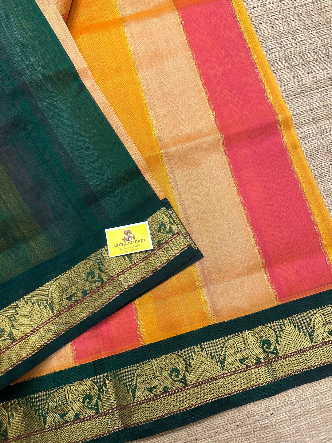 A fusion of Colours Pink , Biscuit and Orange with Green Border and Pallu Korvai Silk Cotton Saree